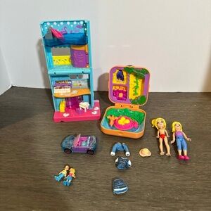 Polly pocket dolls clothes and cases lot of 11 piece